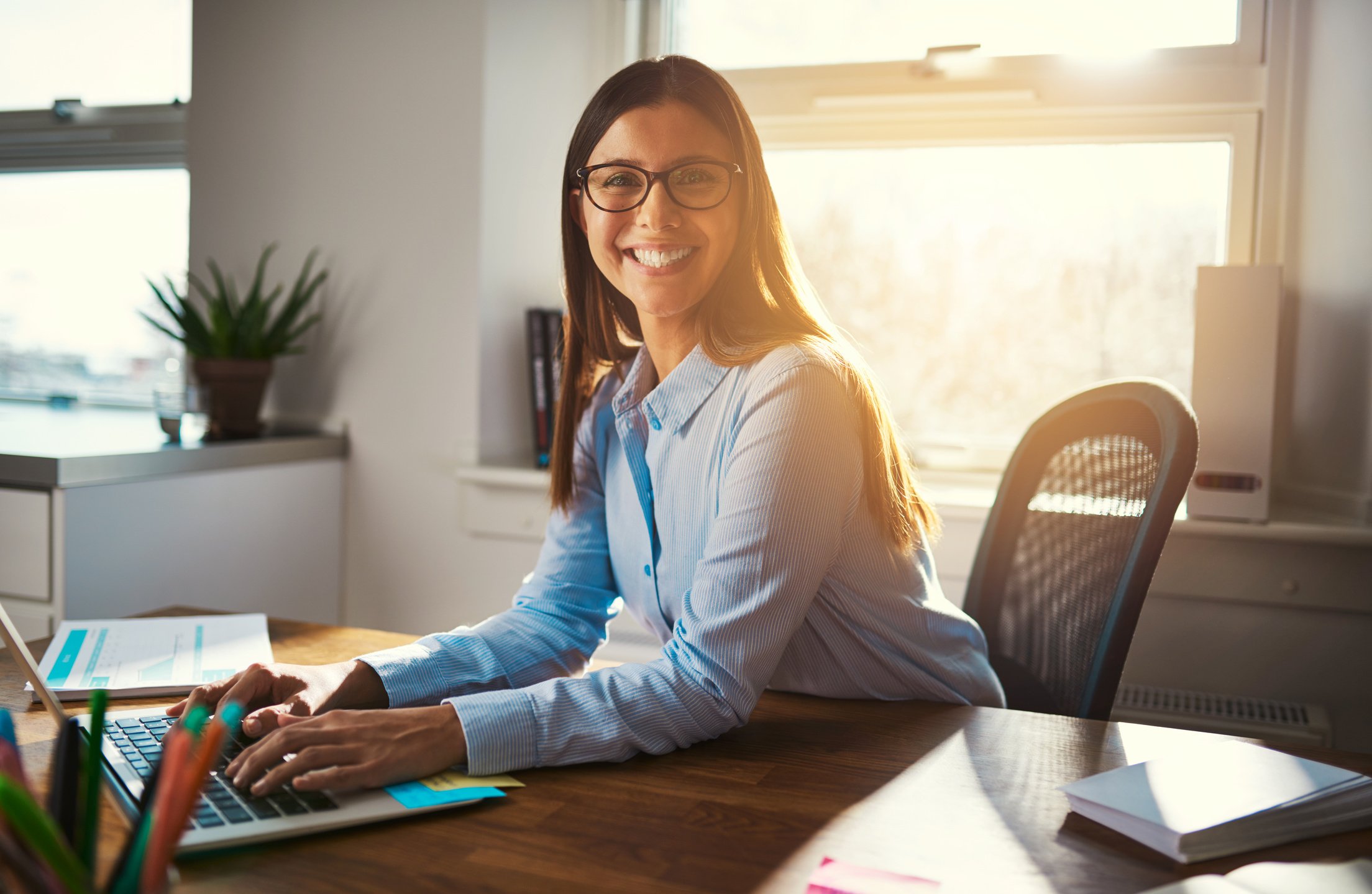 Female Entrepreneur at Desk